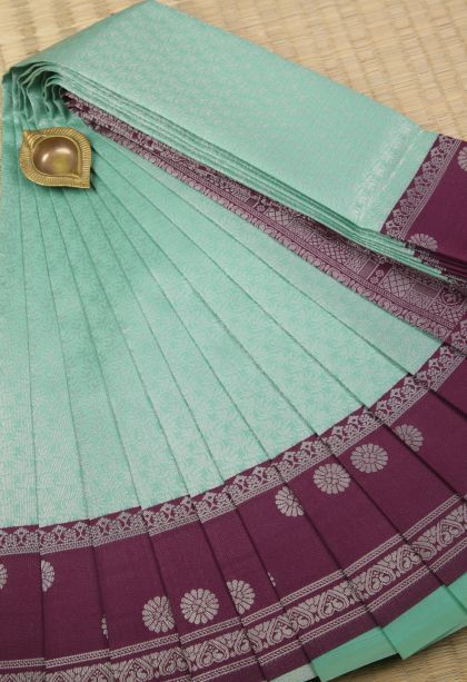 Pistachio Green Visiri Madippu Silk Sarees with Silver Zari Floral Patterns