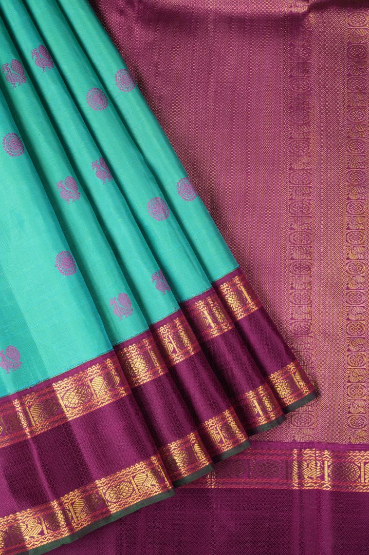 Seafoam Green Kanchipuram Silk Sarees with Gold Zari Peacock Motifs view 1