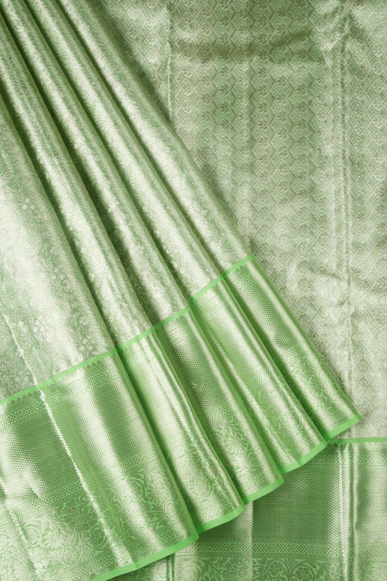 Lime Green Kanchipuram Silk Sarees with Silver Zari Floral Patterns view 1