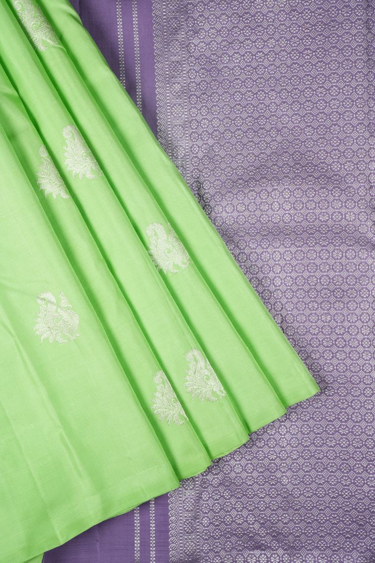 Lime Green Kanchipuram Silk Sarees with Silver Zari Peacock Motifs view 1