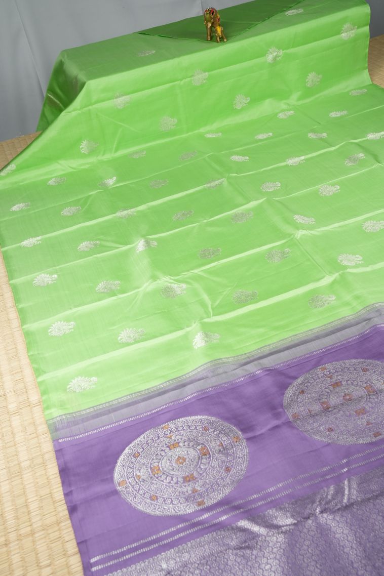 Lime Green Kanchipuram Silk Sarees with Silver Zari Peacock Motifs view 2