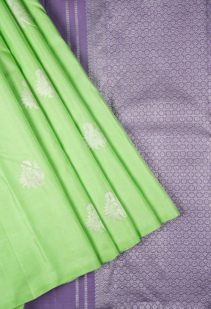 Lime Green Kanchipuram Silk Sarees with Silver Zari Peacock Motifs