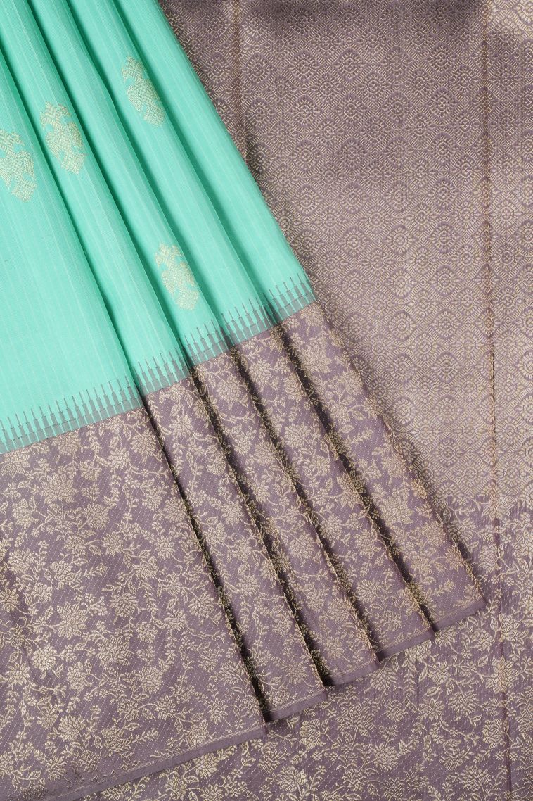 Sky Blue Kanchipuram Silk Sarees with Gold Zari Peacock Motifs view 1