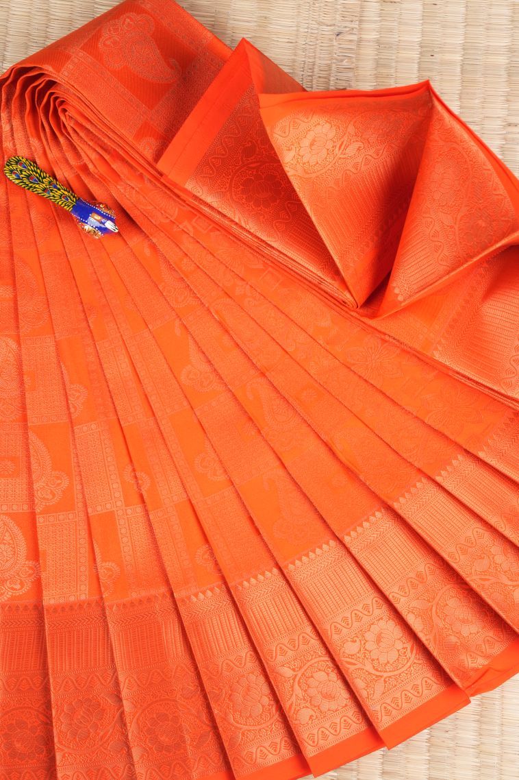 Tiger Orange Visiri Madippu Silk Sarees with Copper Zari Floral Patterns view 1