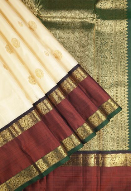 Cream White Kanchipuram Silk Sarees with Gold Zari Buttis (small Dots Or Motifs)