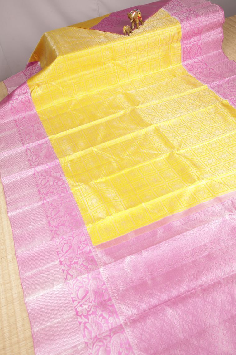 Lemon Yellow Kanchipuram Silk Sarees with Silver Zari Floral Patterns view 2