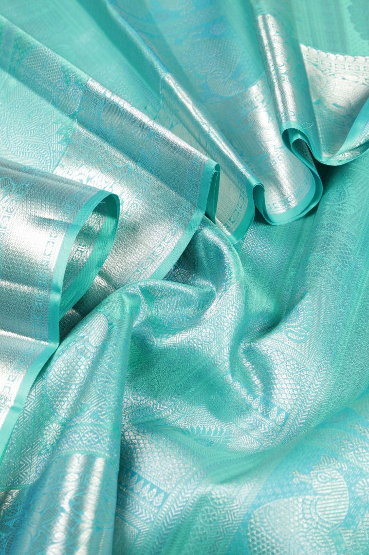 Arctic Blue Kanchipuram Silk Sarees with Silver Zari Floral Patterns view 4