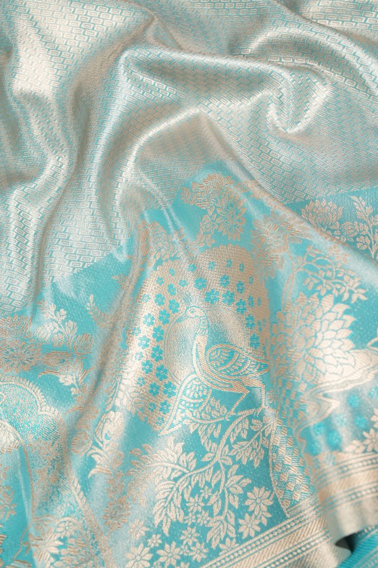 Periwinkle Purple Tissue Silk Sarees with Copper Zari Floral Patterns view 3