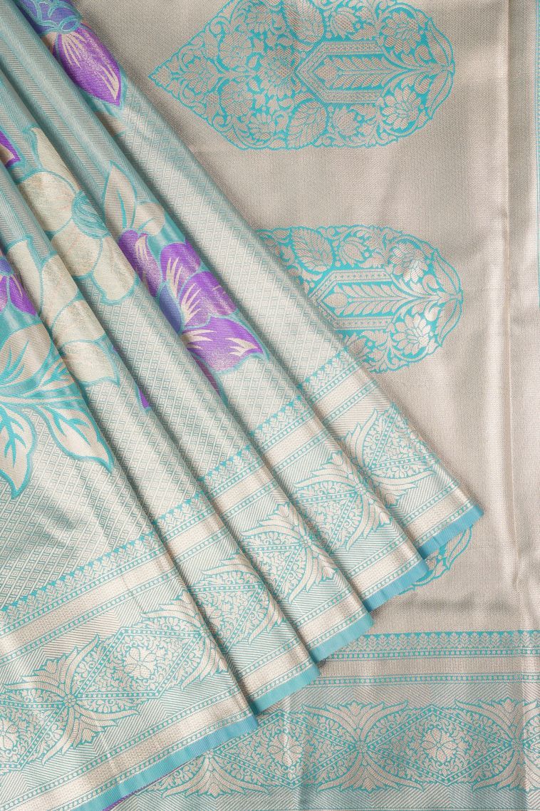 Arctic Blue Tissue Silk Sarees with Copper Zari Floral Patterns view 1