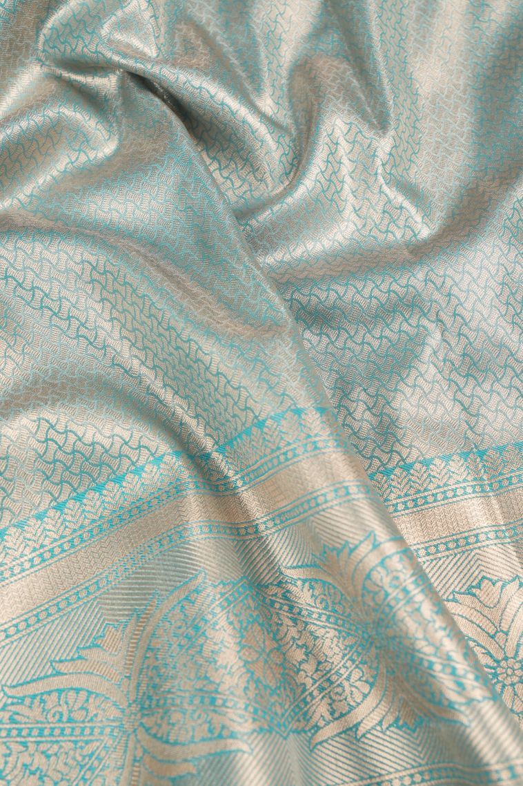 Arctic Blue Tissue Silk Sarees with Copper Zari Floral Patterns view 3