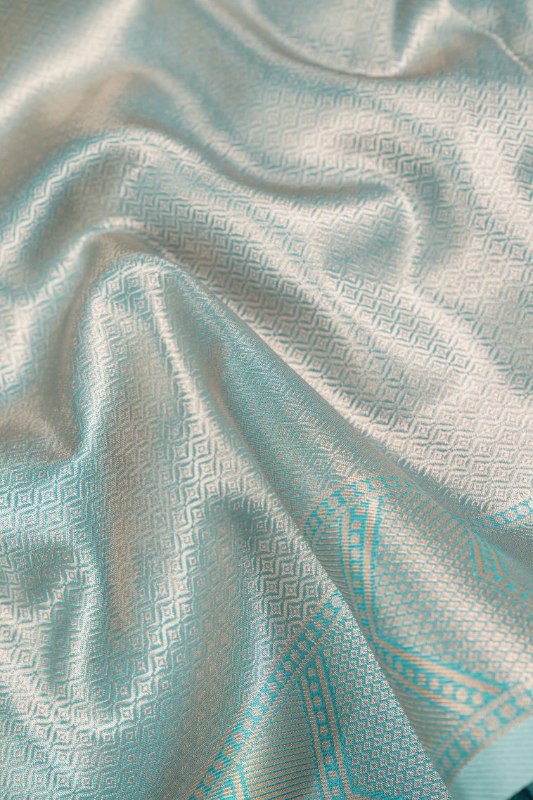 Lace White Tissue Silk Sarees with Copper Zari Floral Patterns view 3