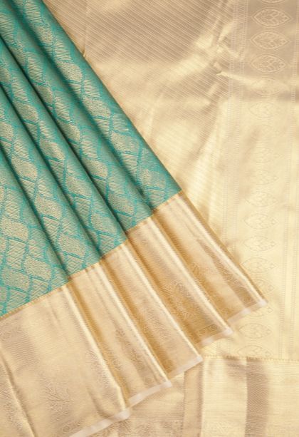 Teal Blue Samudrika Pattu with Copper Zari Floral Patterns