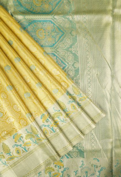 Lemon Yellow Tissue Silk Sarees with Copper Zari Floral Patterns