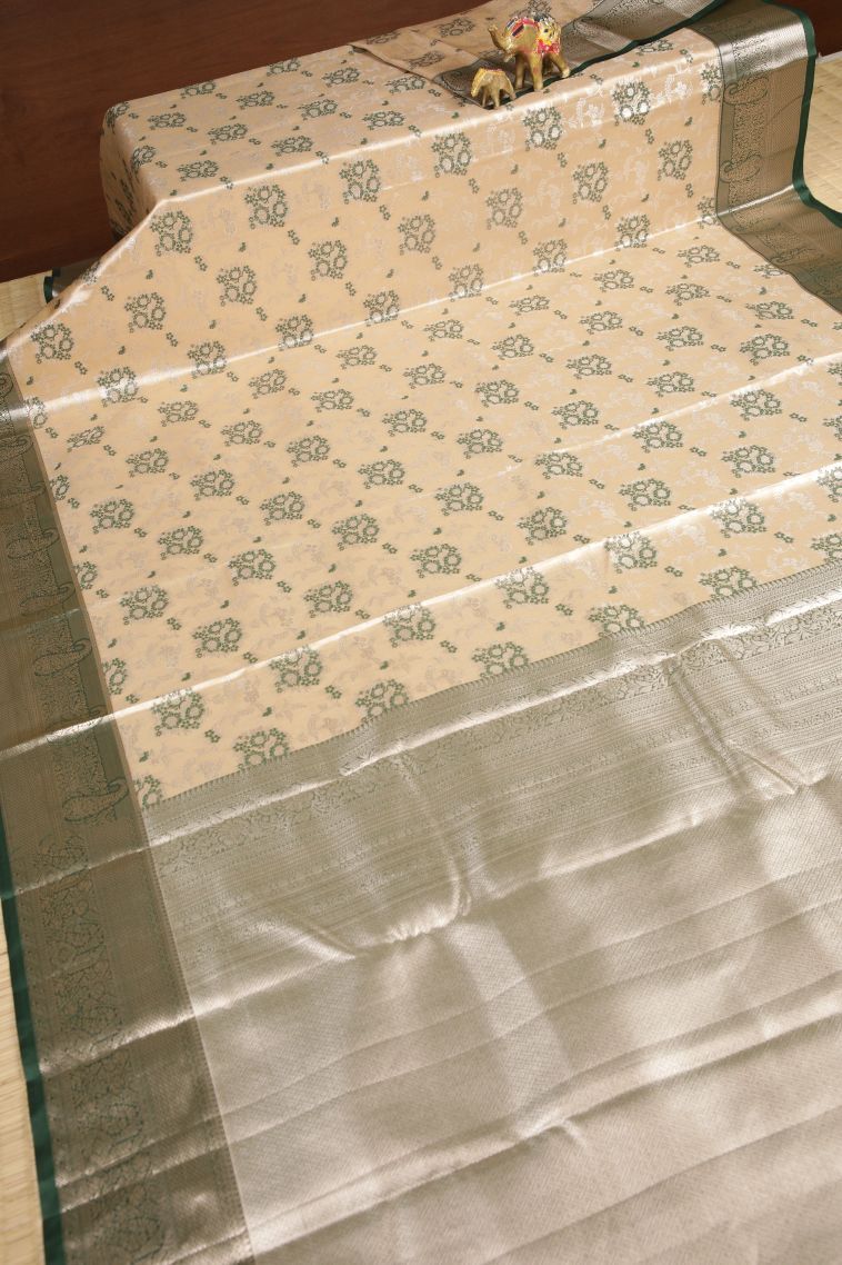 Cream White Tissue Silk Sarees with Silver Zari Floral Patterns view 2