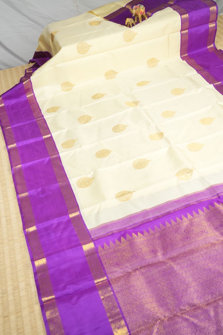 Cream White Kanchipuram Silk Sarees with Gold Zari Peacock Motifs view 2