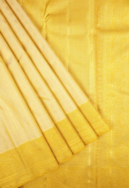 Cream White Kanchipuram Silk Sarees with Gold Zari Buttis (small Dots Or Motifs)