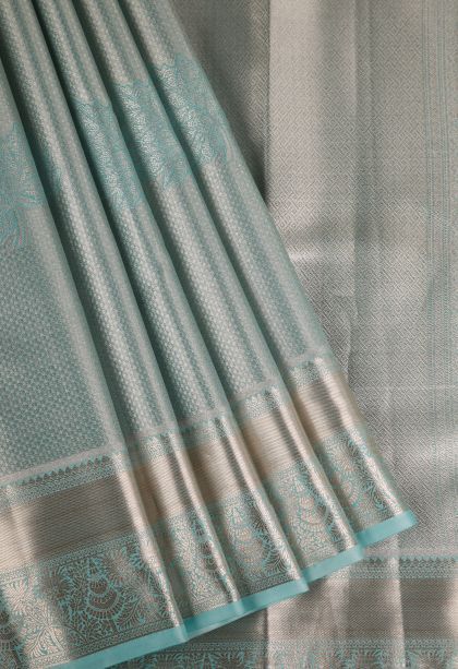 Peacock Blue Tissue Silk Sarees with Gold Zari Floral Patterns