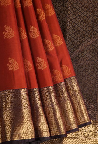 Fire Orange Soft Silk Saree with Gold Zari Floral Puttas