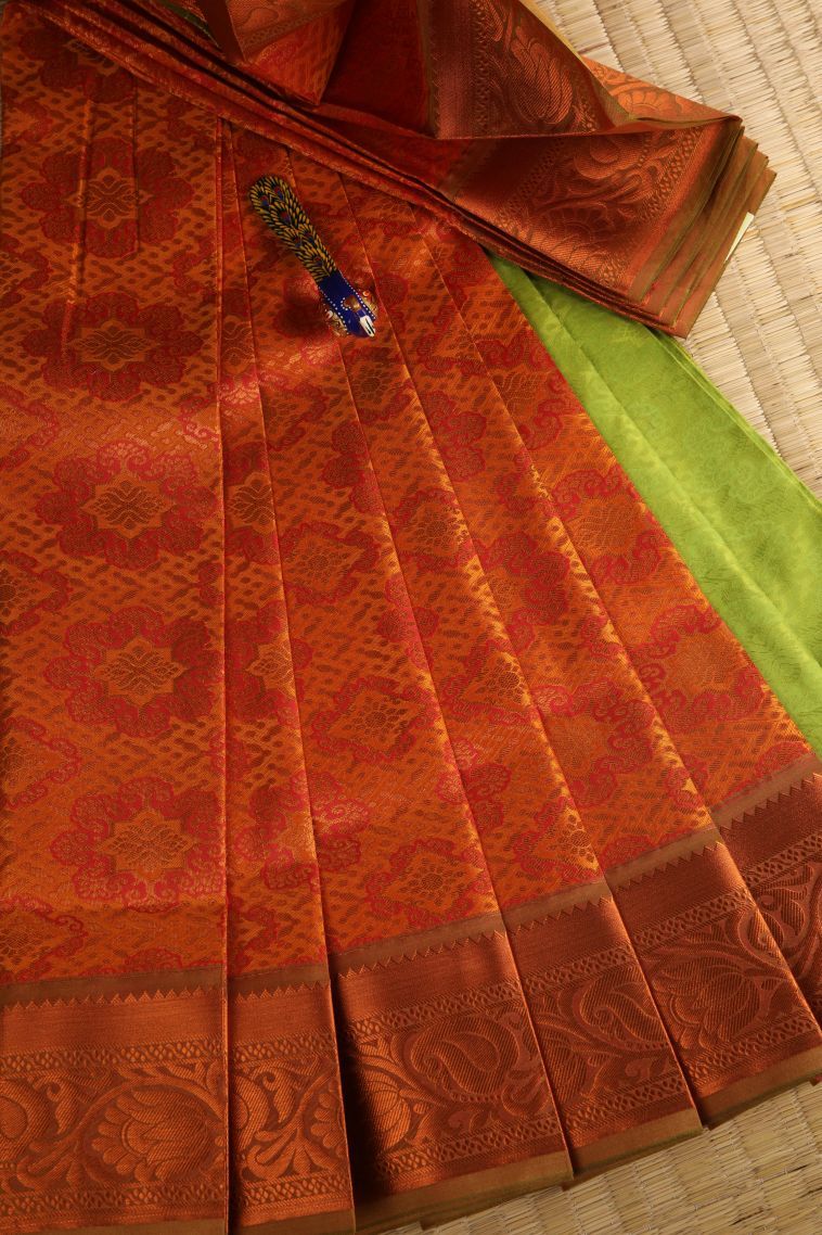 Tiger Orange Visiri Madippu Silk Sarees with Copper Zari Floral Patterns view 1