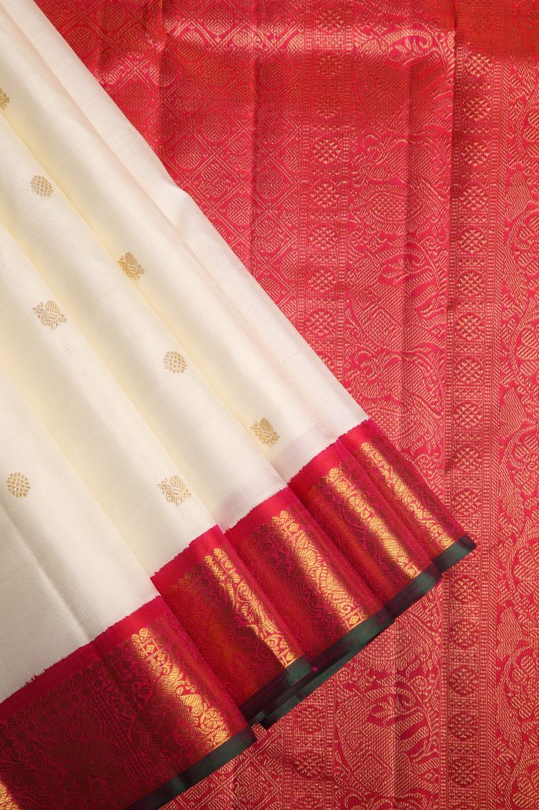 Alabaster White Kanchipuram Silk Sarees with Gold Zari Peacock Motifs view 1
