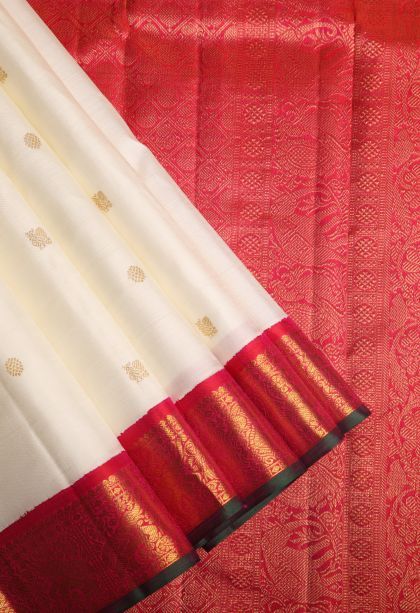 Alabaster White Kanchipuram Silk Sarees with Gold Zari Peacock Motifs