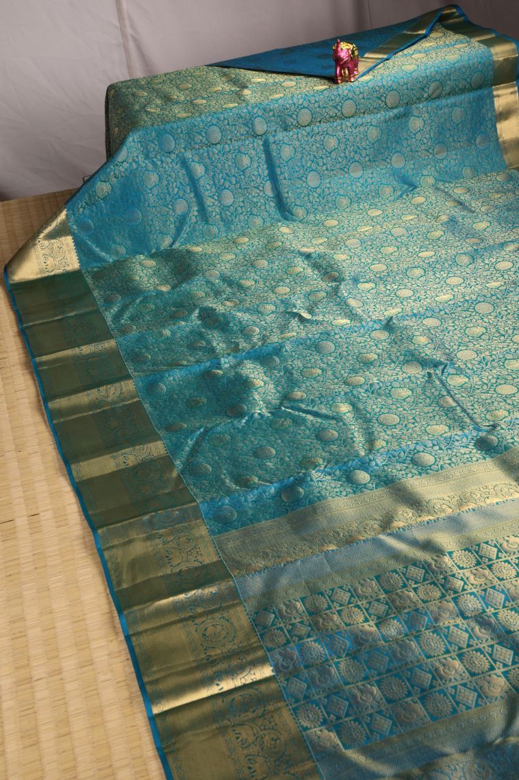 Cerulean Blue Kanchipuram Silk Sarees with Gold Zari Floral Patterns view 2