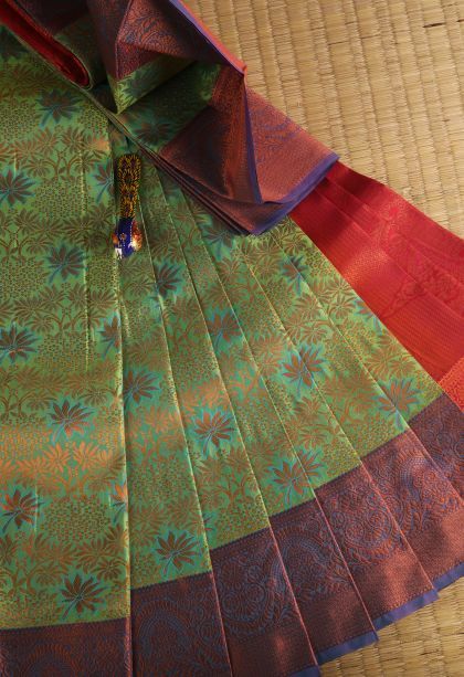 Forest Green Visiri Madippu Silk Sarees with Copper Zari Floral Patterns
