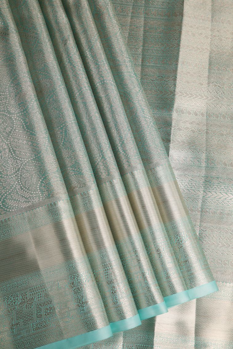 Arctic Blue Tissue Silk Sarees with Gold Zari Floral Patterns view 1
