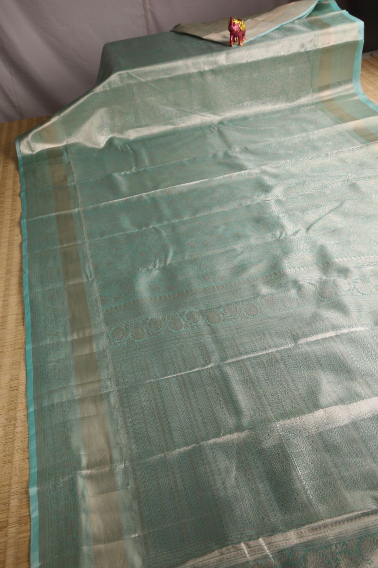 Arctic Blue Tissue Silk Sarees with Gold Zari Floral Patterns view 2