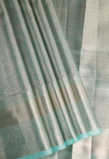 Arctic Blue Tissue Silk Sarees with Gold Zari Floral Patterns