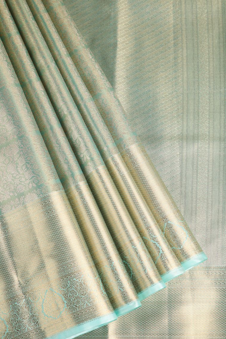 Mint Green Tissue Silk Sarees with Gold Zari Floral Patterns view 1