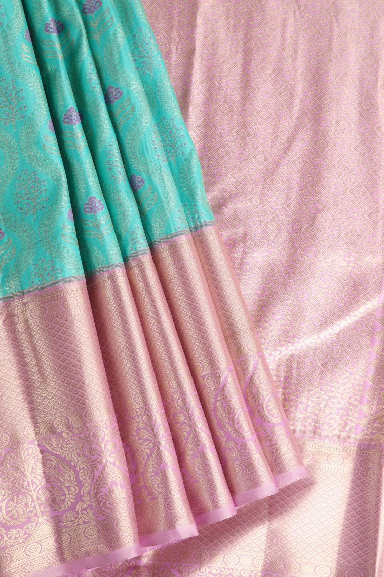 Arctic Blue Tissue Silk Sarees with Gold Zari Floral Patterns view 1