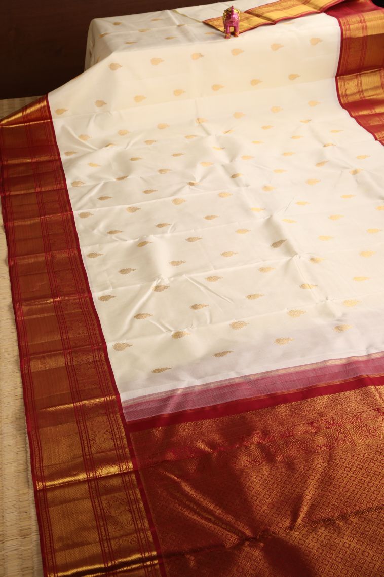 Ivory White Kanchipuram Silk Sarees with Gold Zari Peacock Motifs view 2