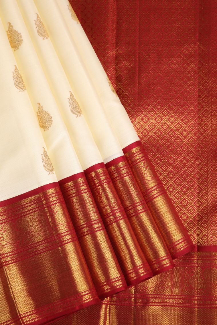 Ivory White Kanchipuram Silk Sarees with Gold Zari Peacock Motifs view 1