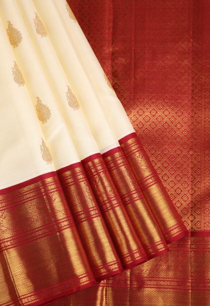 Ivory White Kanchipuram Silk Sarees with Gold Zari Peacock Motifs