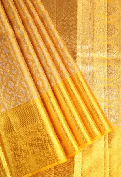 Beige Yellow Kanchipuram Silk Sarees with Gold Zari Floral Patterns