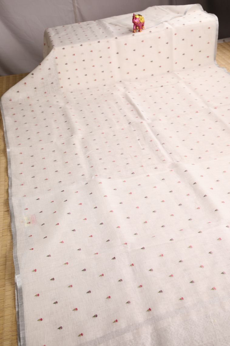 Alabaster White Linen Saree with Without Zari Zari Floral Puttas view 2