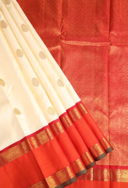 Cream White Kanchipuram Silk Sarees with Gold Zari Floral Puttas