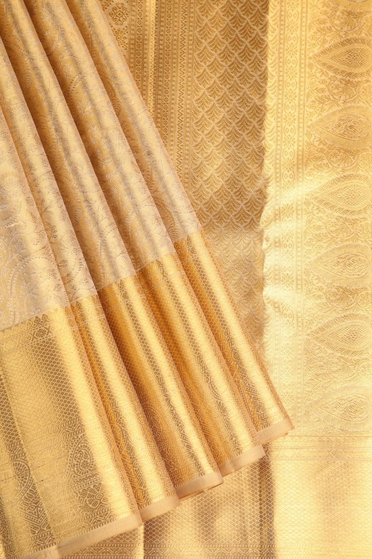 Oat Yellow Kanchipuram Silk Sarees with Gold Zari Floral Patterns view 1