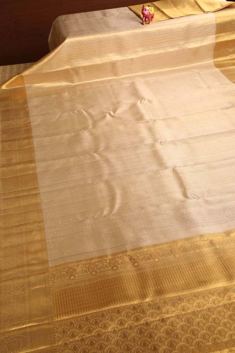 Oat Yellow Kanchipuram Silk Sarees with Gold Zari Floral Patterns view 2