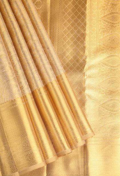 Oat Yellow Kanchipuram Silk Sarees with Gold Zari Floral Patterns