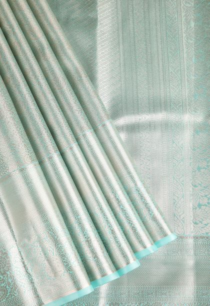 Teal Blue Tissue Silk Sarees with Gold Zari Floral Patterns