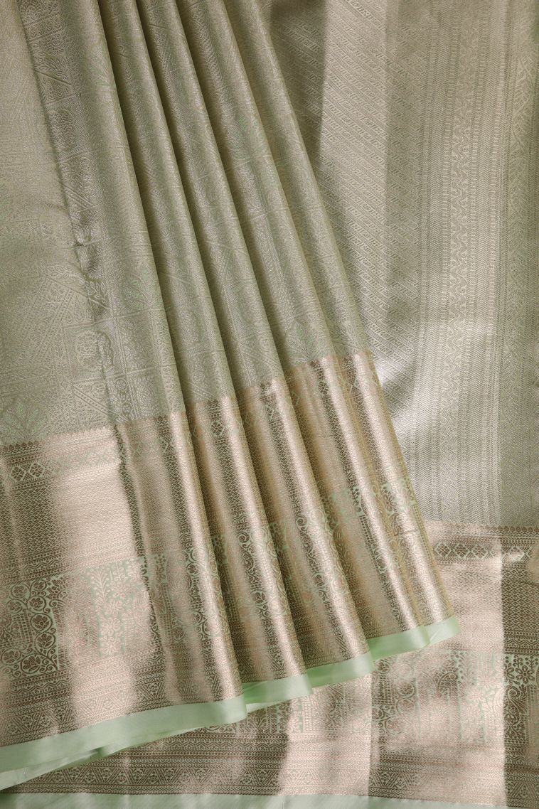 Pistachio Green Tissue Silk Sarees with Gold Zari Floral Patterns view 1