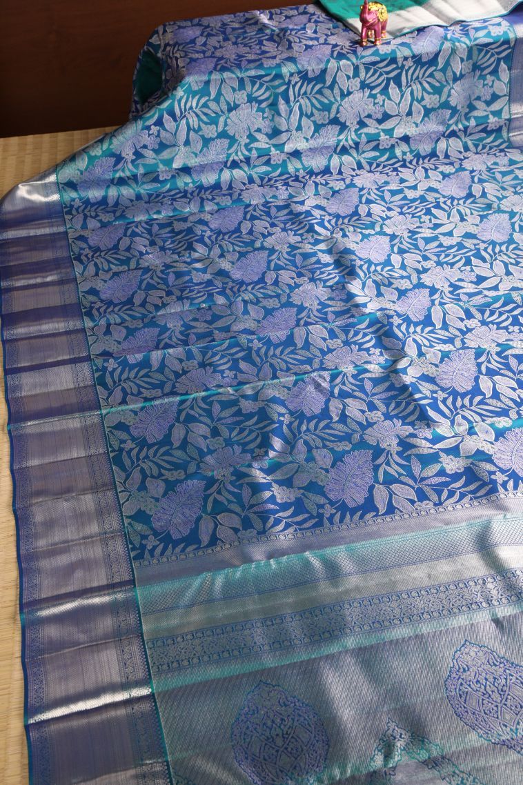 Cerulean Blue Kanchipuram Silk Sarees with Silver Zari Floral Patterns view 2
