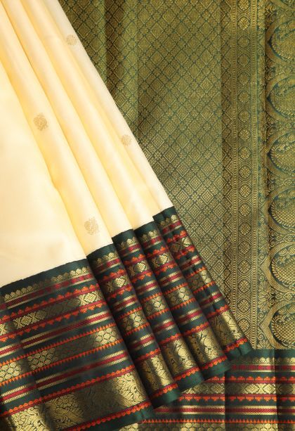 Alabaster White Kanchipuram Silk Sarees with Gold Zari Peacock Motifs