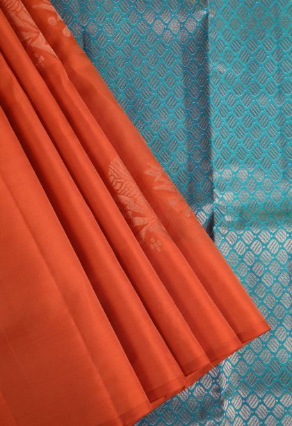 Fire Orange Soft Silk Saree with Copper Zari Floral Puttas